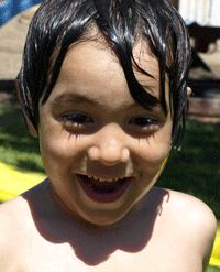 Kai Plays with the Garden Hose